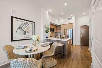 Modern wide-plank wood-style flooring throughout*